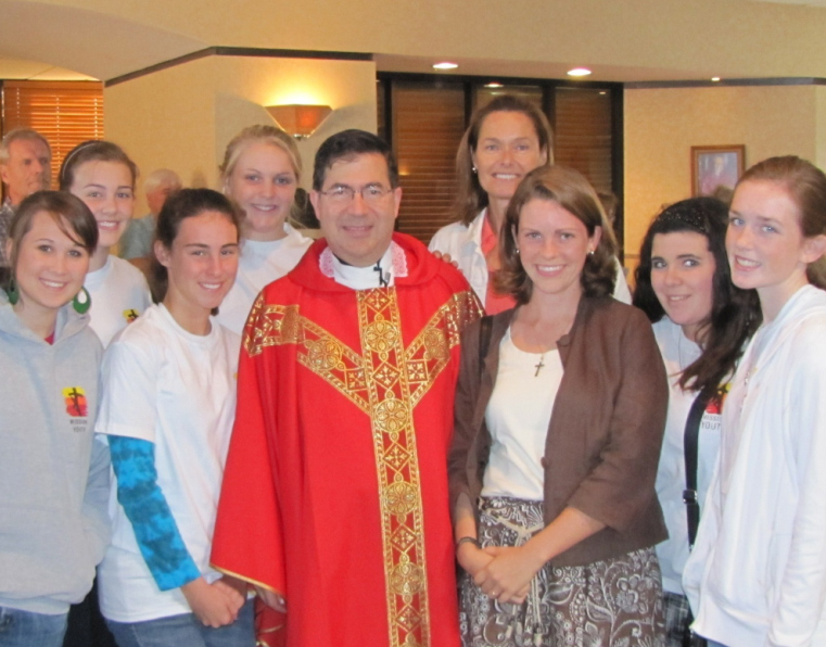 Fr. Frank Pavone of Priests for Life poses with group from Mission Youth