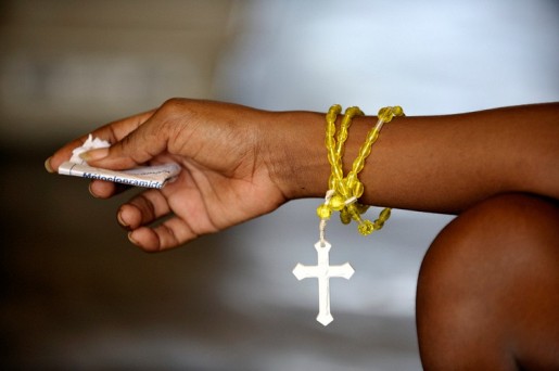 Haitian arm with cross