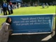 Kate O'Connor before a banner at the Royal Dublin Society