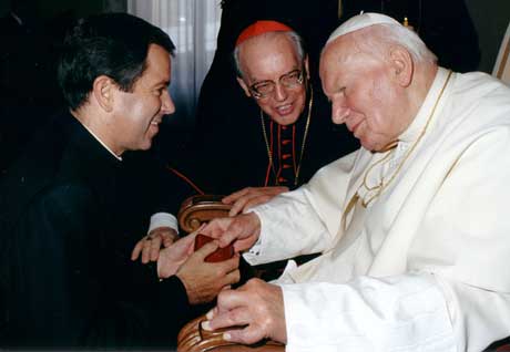 Father Alvaro Corcuera, LC, greets Pope John Paul II along with Cardinal Giovanni Battista Re, prefect of the Congregation for Bishops.