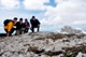 Br. John Choi LC (left) and friends climbing a mountain