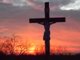 The crucifix behind St. John the Baptist parish in Colerain, Ohio, at sundown