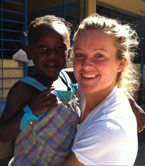 Claire Lasceski shares some love and laughter with a child