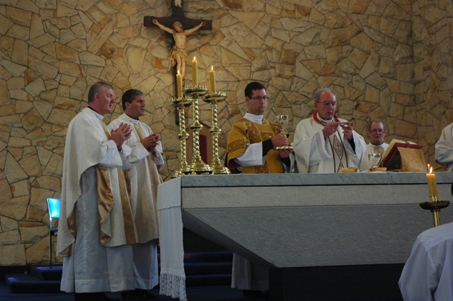 Deacon David Joyce assists at Mass