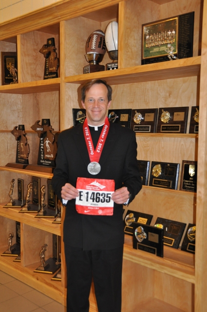 Fr. Daniel with Chicago marathon medal