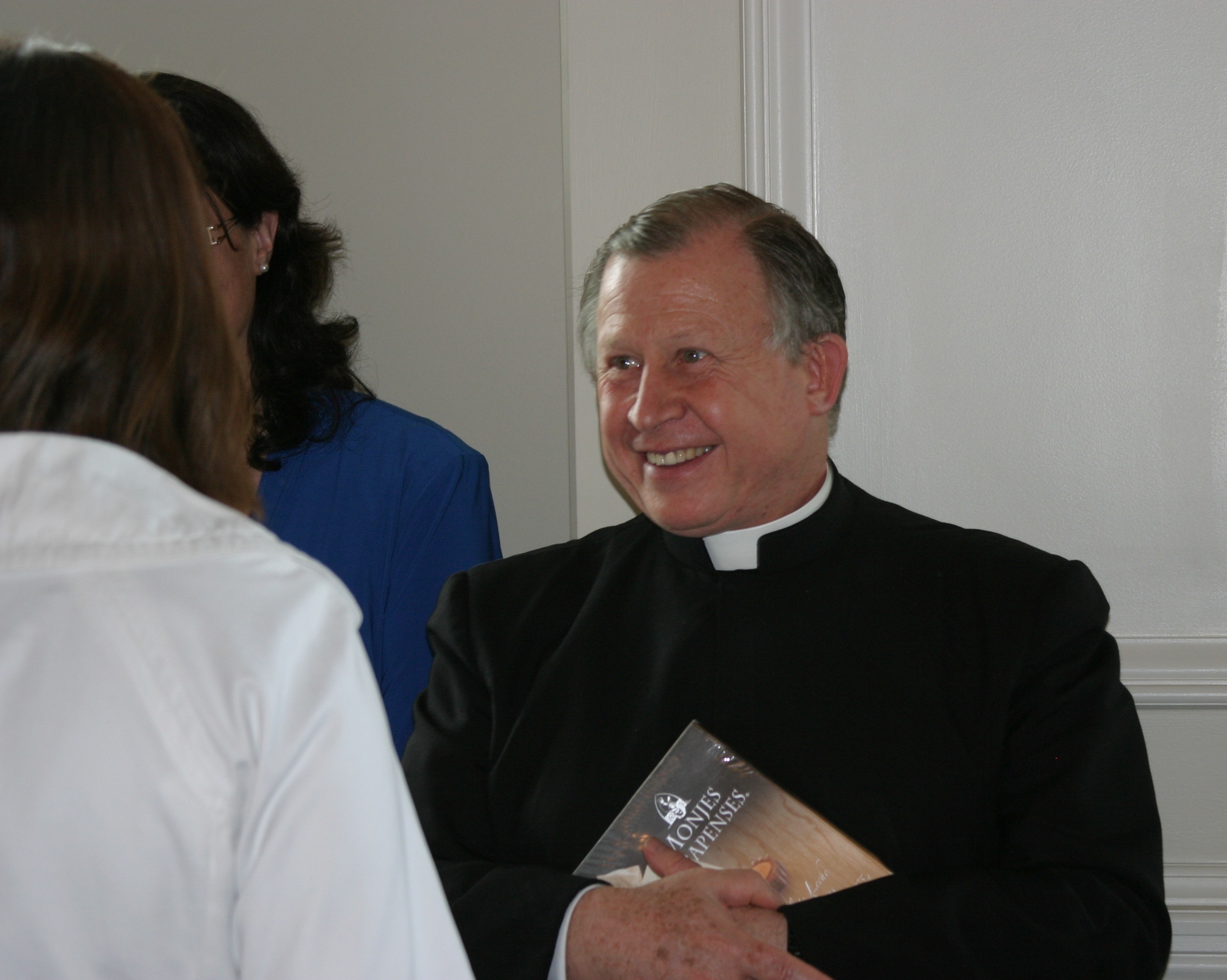 Fr. Gil talking with consecrated women