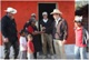 Fr. Michael Mitchell LC hands over the keys of her new home to the homeowner