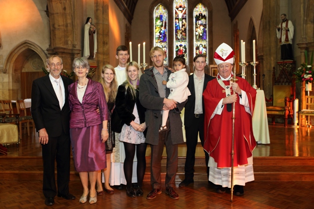 Deacon Stephen Howe LC with his family and bishop