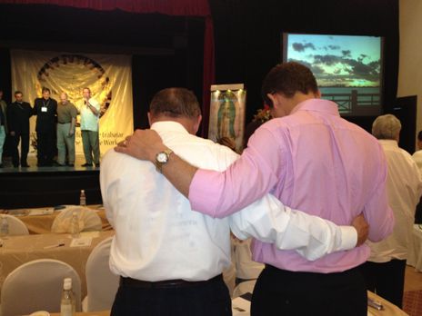 In prayer at the Cancun Summit