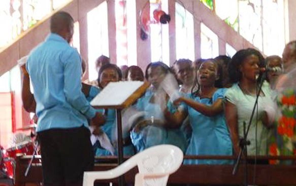 Nicaise with the parish choir.