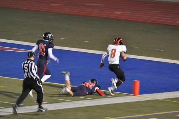 Nick playing football