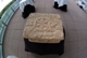 A replica of the Magdala Stone at a fundraising event