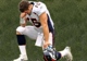 Denver Broncos Quarterback Tim Tebow in prayer