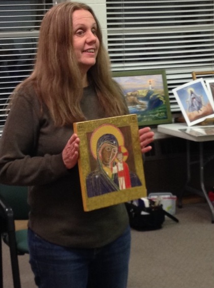Artist with her art